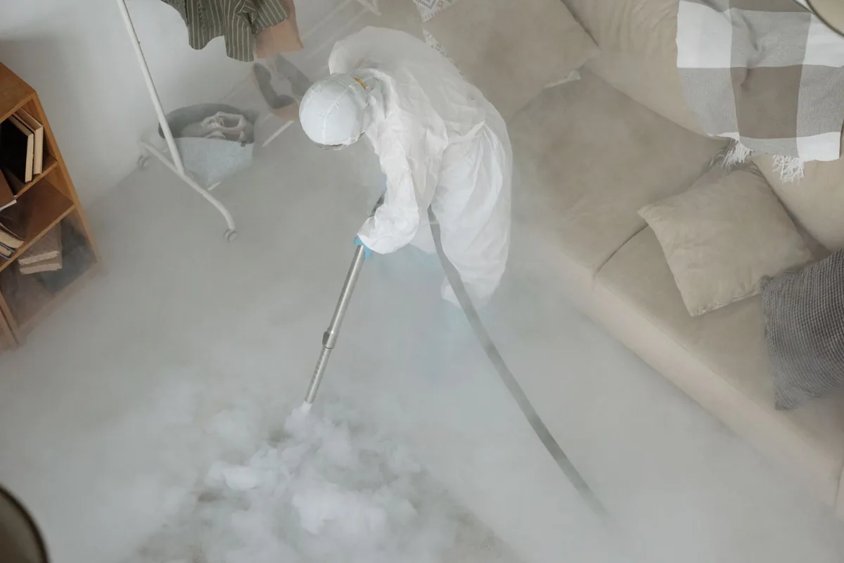Biohazard cleanup technician in protective equipment, Mauston, WI